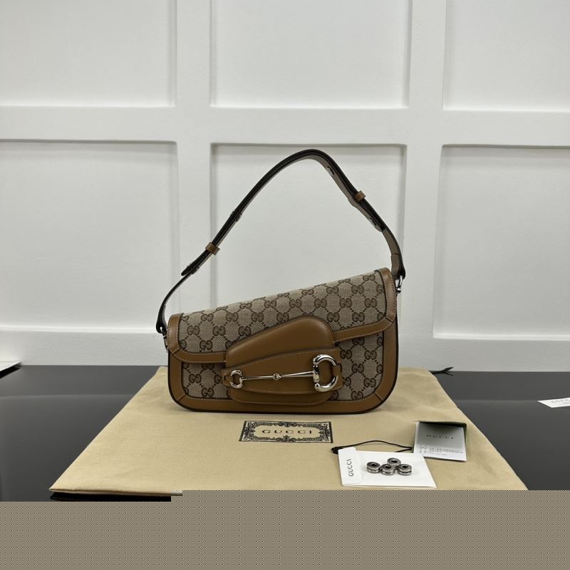 G*u*i top handle bags